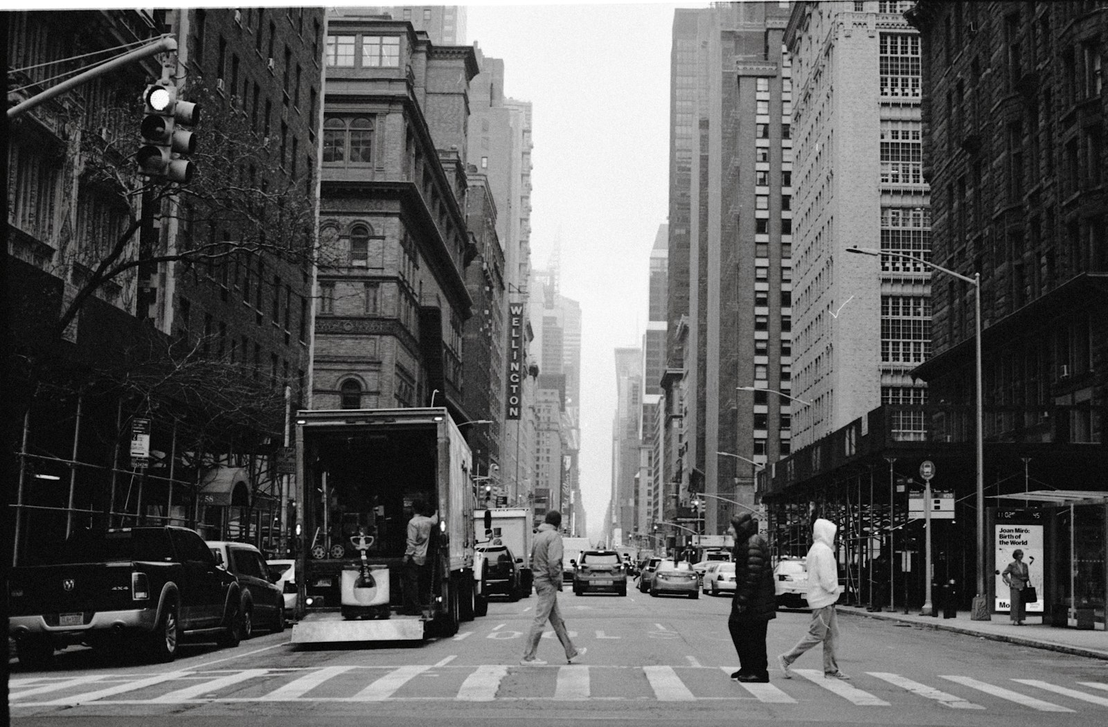 A monochrome city street scene