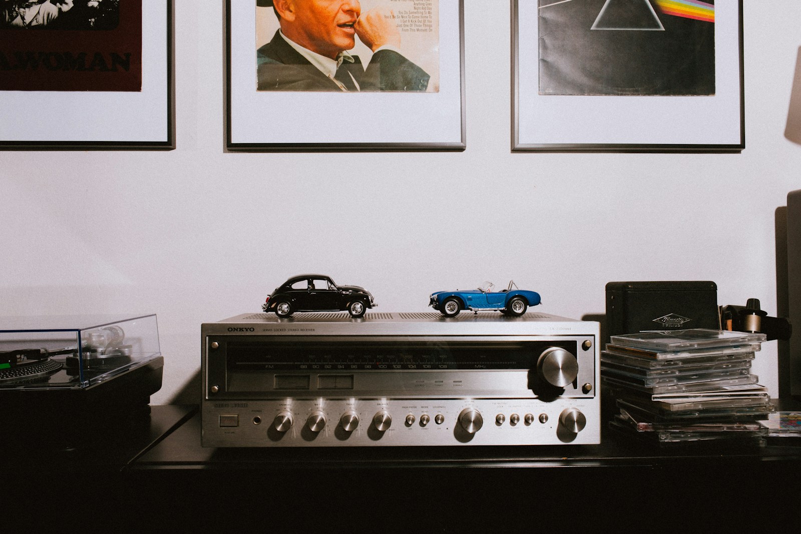Vintage silver audio equipment on a wooden table